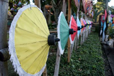 Close-up of umbrellas against blurred background