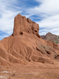 Rock formations in desert against sky