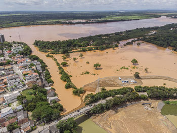 Flooded river with mud after construction of dam