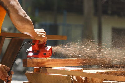 Carpenter working on wood