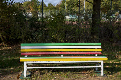 Empty bench in park