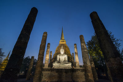 Low angle view of temple building against sky