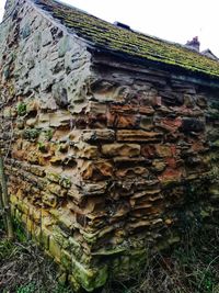 Low angle view of building wall