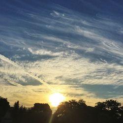 Sun shining through clouds