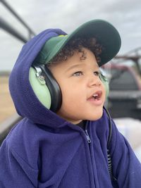 Close-up of boy looking away