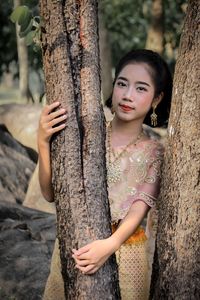 Girl in traditional clothing at park