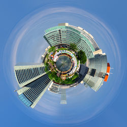 Little planet format of city and sky