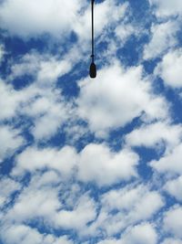 Low angle view of street light against sky