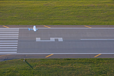 High angle view of yellow flag on field