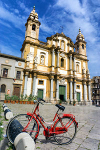 Bicycle parked outside building