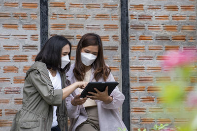 Young woman using mobile phone