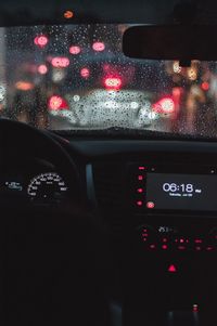 Raindrops on windshield of car