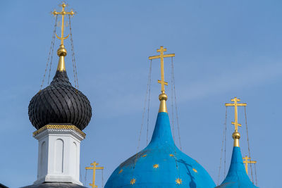 Low angle view of traditional building against blue sky