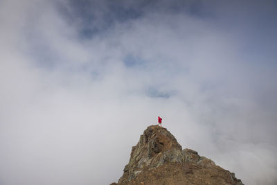 High angle view of hiker standing on cheam peak against cloudy sky