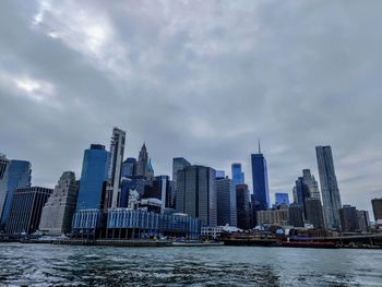 Modern buildings in city against sky