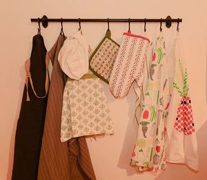 Dish towels, oven glove, oven mitts and bib aprons for adult even children.