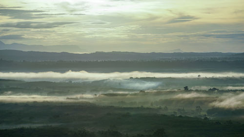 Scenic view of landscape against sky during sunset