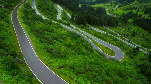 High angle view of road amidst mountain