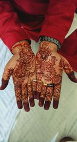 Midsection of woman with text on carpet