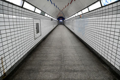 Long empty underground subway path