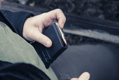 High angle view of man using mobile phone