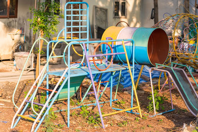 Empty chairs against building