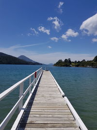 Pier over sea against sky