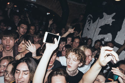 Group of people at music concert