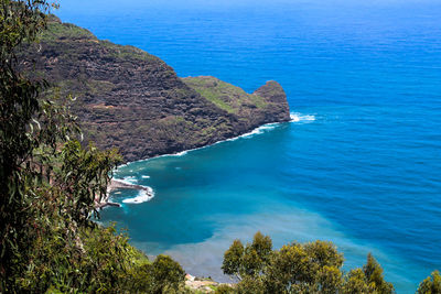 High angle view of bay against clear blue sky