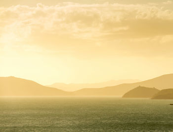 Scenic view of landscape against sky during sunset