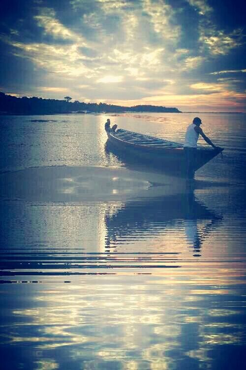 water, sky, sea, tranquil scene, tranquility, silhouette, beauty in nature, cloud - sky, reflection, scenics, nature, waterfront, lake, sunset, bird, cloud, one person, idyllic, full length, rippled