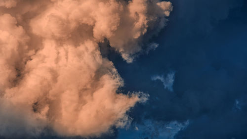 Low angle view of clouds in sky during sunset