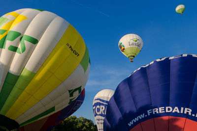 Low angle view of hot air balloons