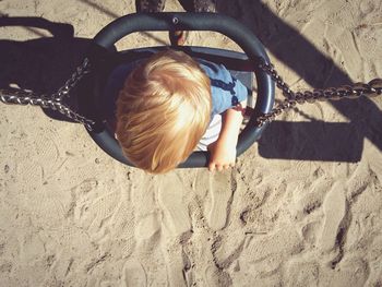 High angle view of boy on beach