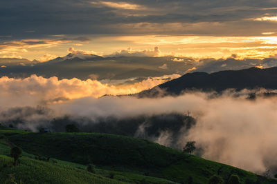 Scenic view of mountains against sky during sunset