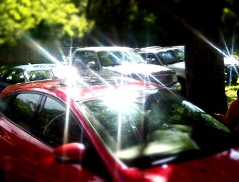 Close-up of car on road