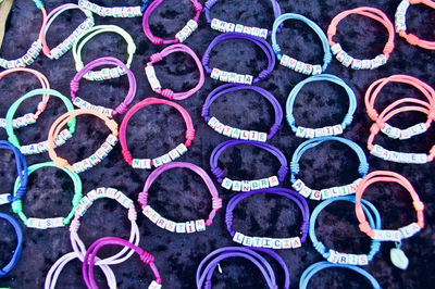 High angle view of rubber bracelets on table