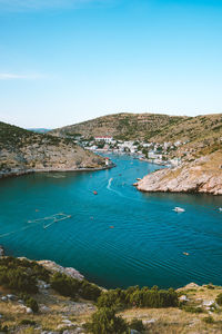 High angle view of sea against blue sky