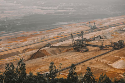 High angle view of tire tracks on landscape