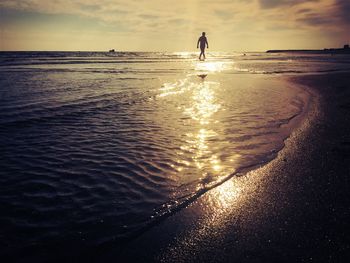 Scenic view of beach during sunset