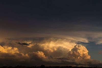 Scenic view of dramatic sky over landscape