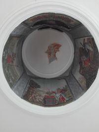 High angle view of painting on glass