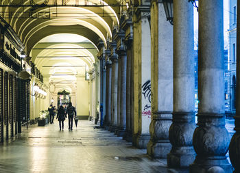 People walking in corridor