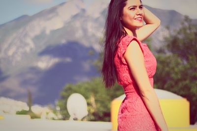 Portrait of a beautiful young woman looking away