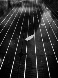 High angle view of arrow symbol on road