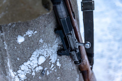 High angle view of snow on metal during winter