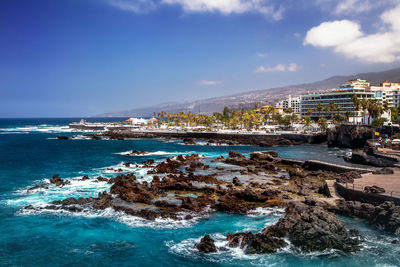 Coastal paradise at the city by  natural pool with turquoise water at the tenerife island