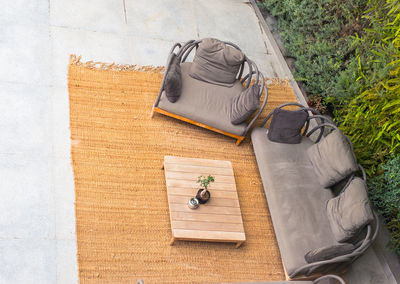 High angle view of sofas and table