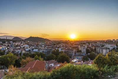 High angle view of townscape against sky during sunset