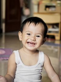 Portrait of smiling boy at home